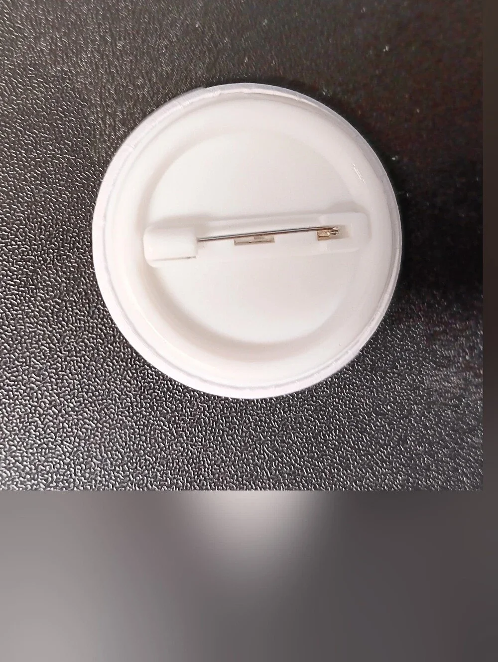 The Unbranded Brand round pinback